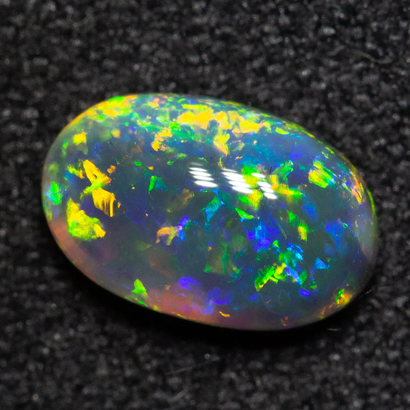 0.68 ct black opal 7.5x4.7x2.8mm - Image 2