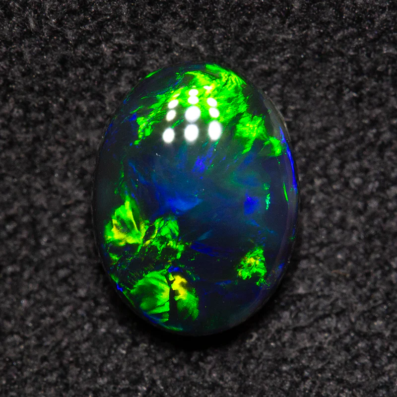 0.68 ct black opal 7x5.3x2.5mm - Image 2