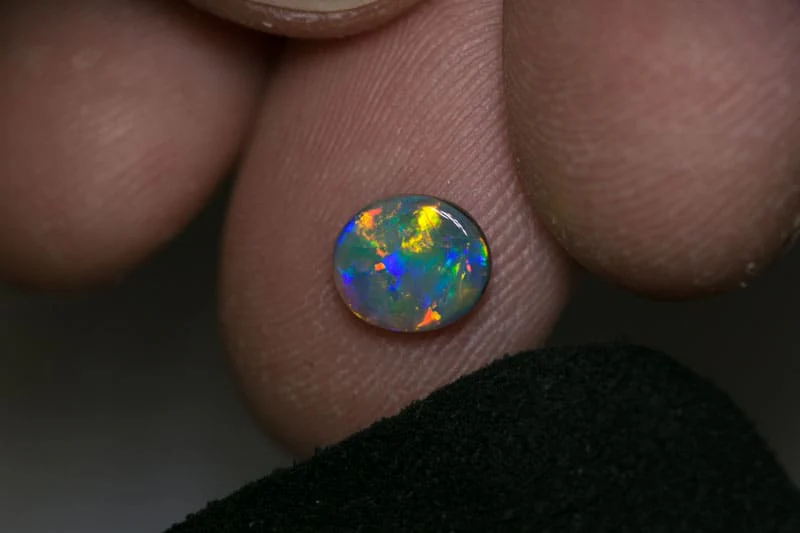 0.68 ct black opal 7x6x2mm - Image 3