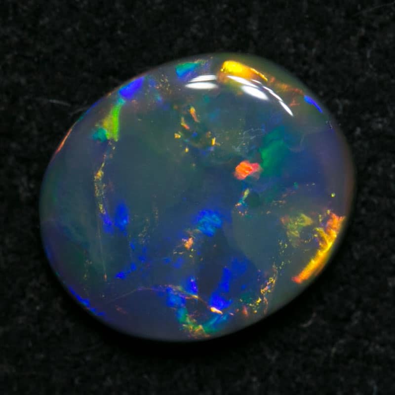 0.68 ct black opal 7x6x2mm - Image 4