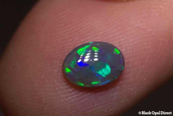 0.68 ct black opal 8x6x2mm - Image 2