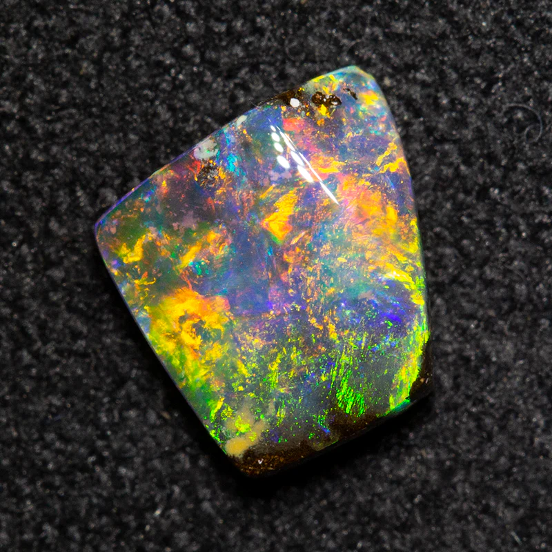 0.68 ct boulder opal 6x5.6x2.1mm - Image 2