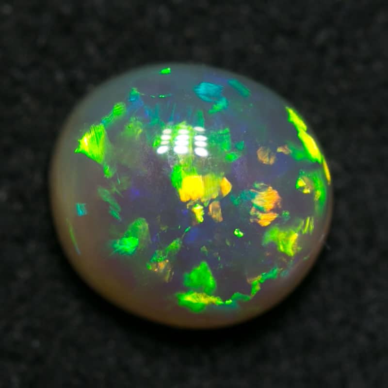 0.68 ct crystal opal 5.5x5x3mm - Image 2