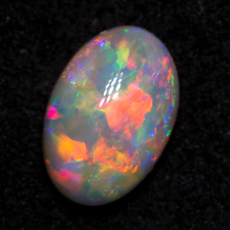 0.68 ct crystal opal 7x4.5x3mm - Image 3