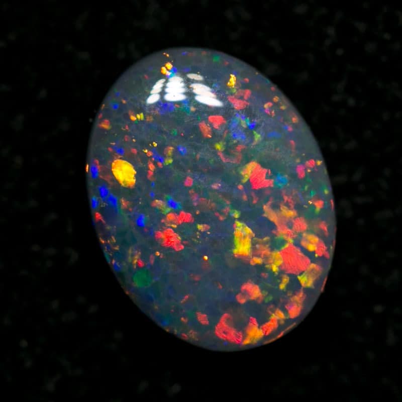 0.68 ct dark opal 7x5.5x2mm - Image 3