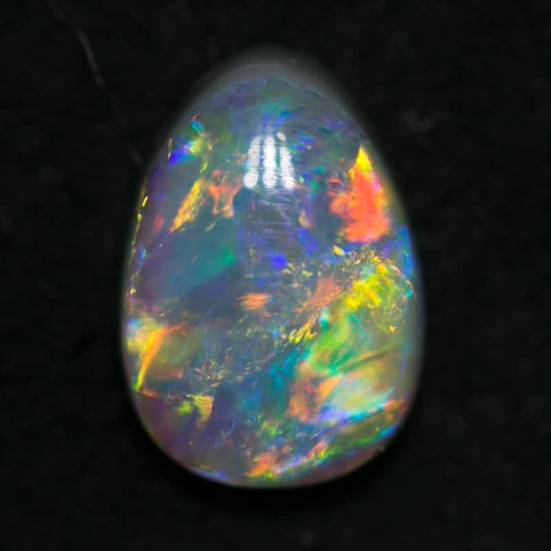 0.68 ct drop shaped dark opal 7x5x2.5mm - Image 2