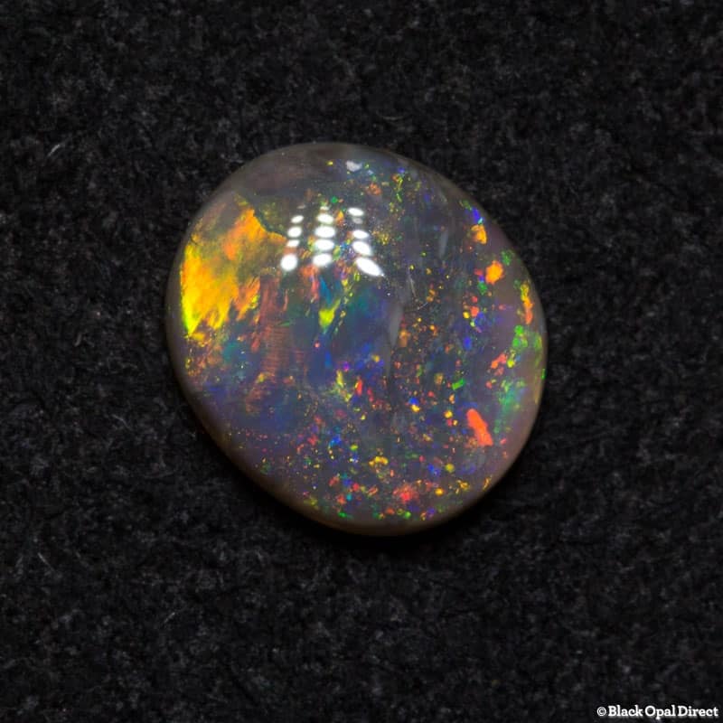 0.68 ct semi black opal 7x6x2mm - Image 3