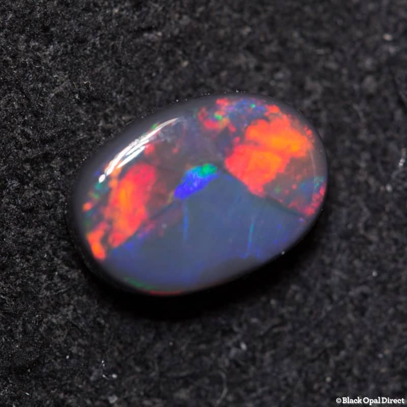 0.69 ct black opal 7x5x2.5mm - Image 3