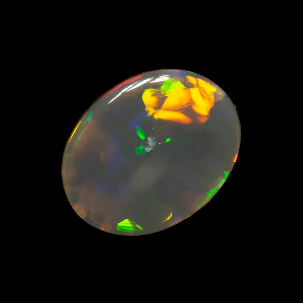 0.69 ct black opal 8.7x6.8x1.6mm - Image 2
