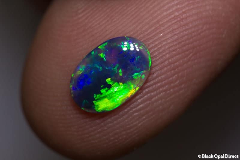 0.69 ct black opal 9x6x1.5mm - Image 2