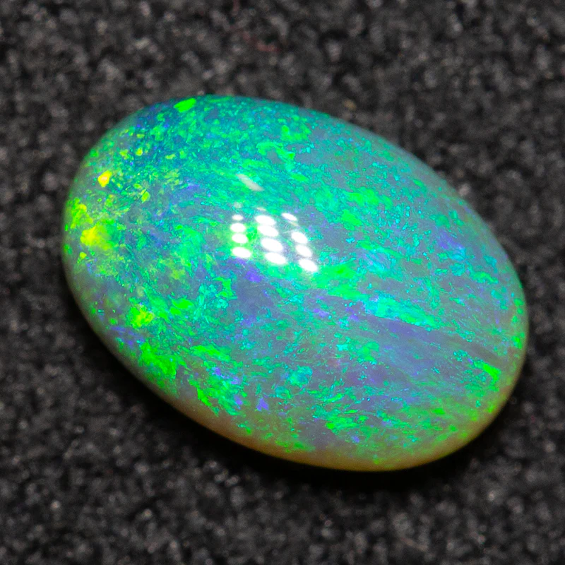 0.69 ct dark opal 7.1x4.9x3.2mm - Image 2