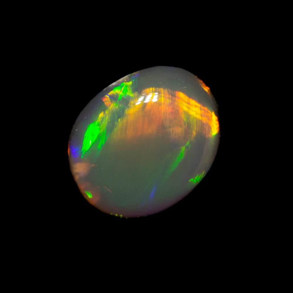 0.70 ct black opal 6.7x5.6x3mm - Image 2