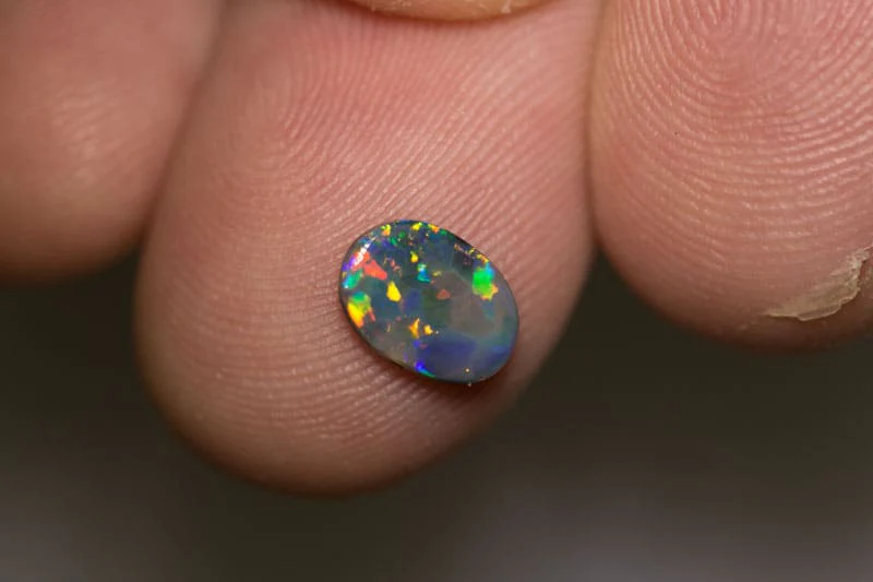 0.70 ct black opal 8x6x1.5mm - Image 2