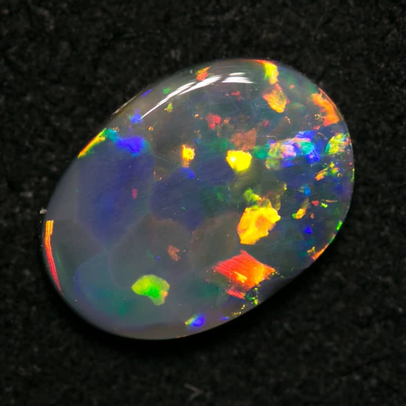 0.70 ct black opal 8x6x1.5mm - Image 3
