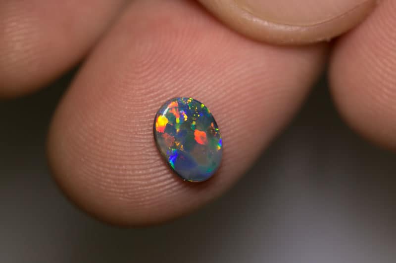 0.70 ct black opal 8x6x1.5mm - Image 4