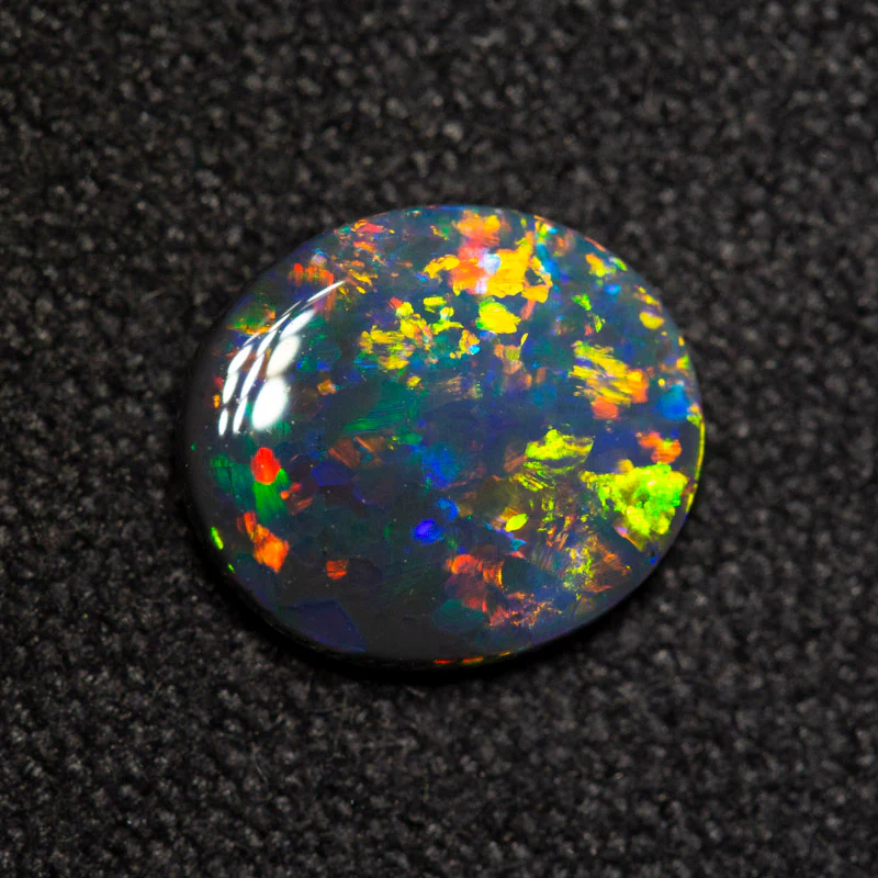 0.70 ct black opal 8x7x1.9mm - Image 4