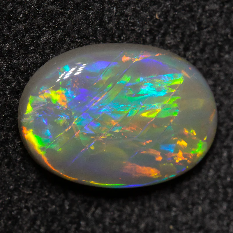 0.70 ct dark opal 8.1x5.8x2.1mm - Image 2