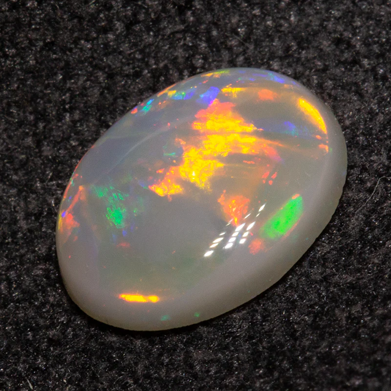 0.70 ct dark opal 8.1x5.9x2.2mm - Image 2