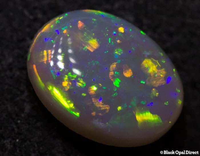 0.70 ct semi black opal 7x5.5x3mm - Image 2