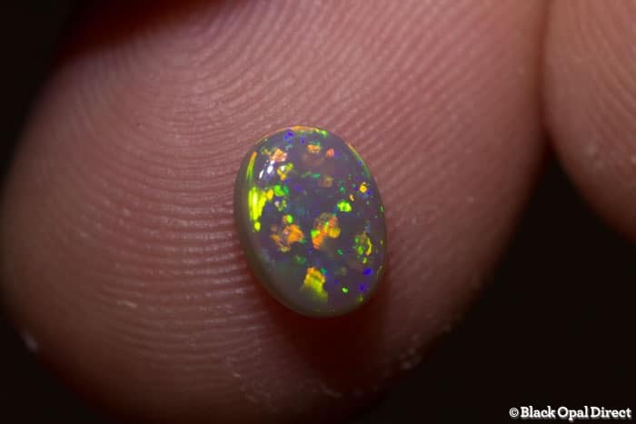 0.70 ct semi black opal 7x5.5x3mm - Image 3