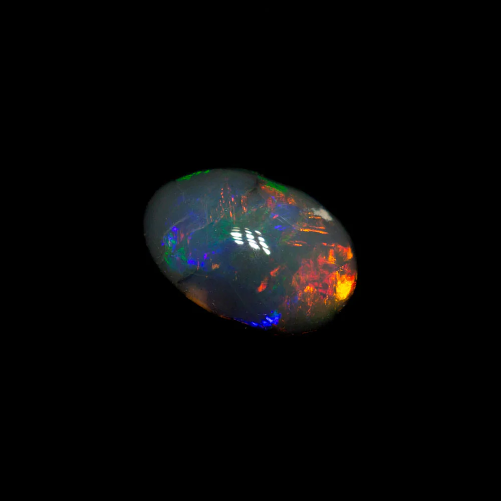 0.71 ct black opal 7x4.7x3.3mm - Image 2