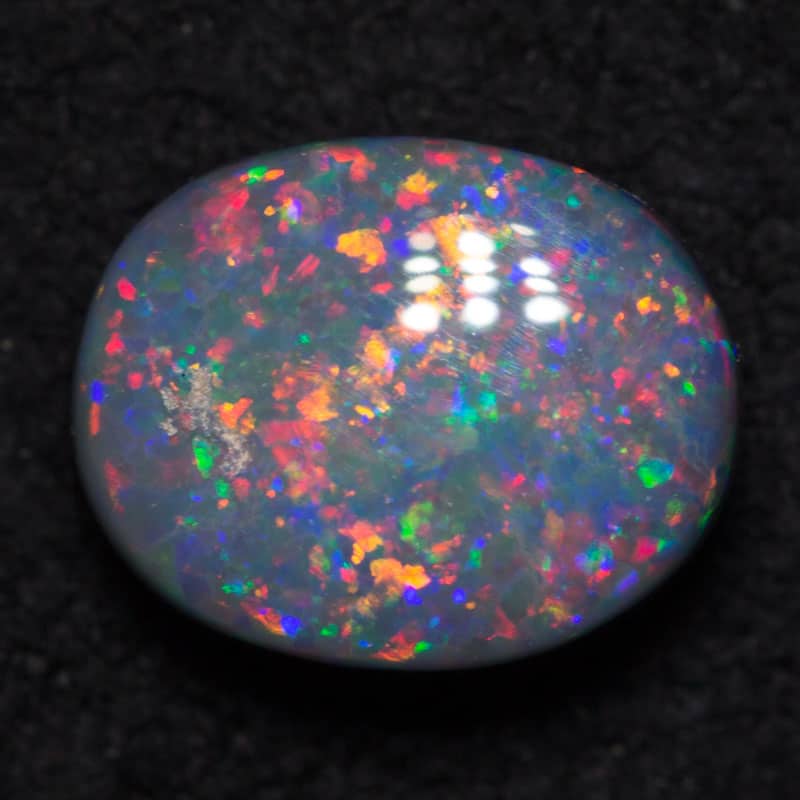 0.71 ct black opal 7x5x2.5mm - Image 2