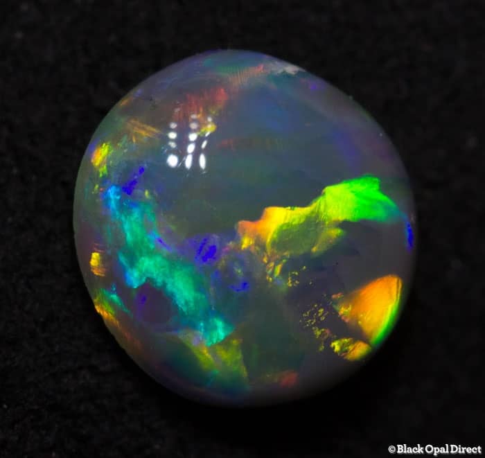 0.71 ct semi black opal 7x6.5x3.5mm - Image 2