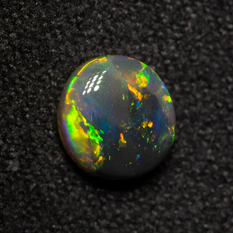 0.72 ct black opal 6.3x5.7x3.1mm - Image 2