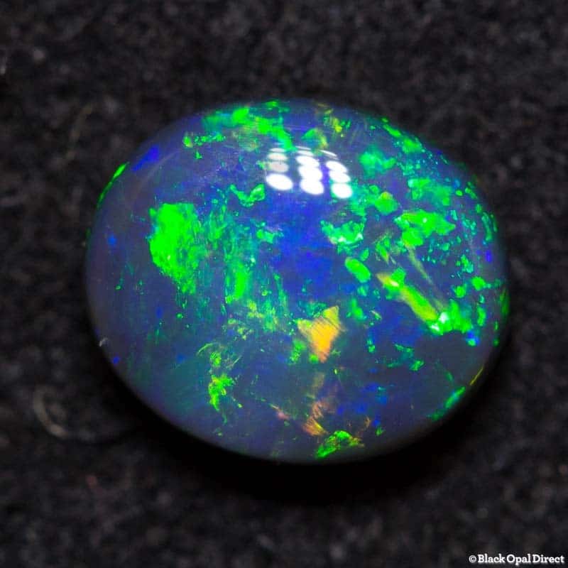 0.72 ct black opal 6.5x5.5x3mm - Image 3