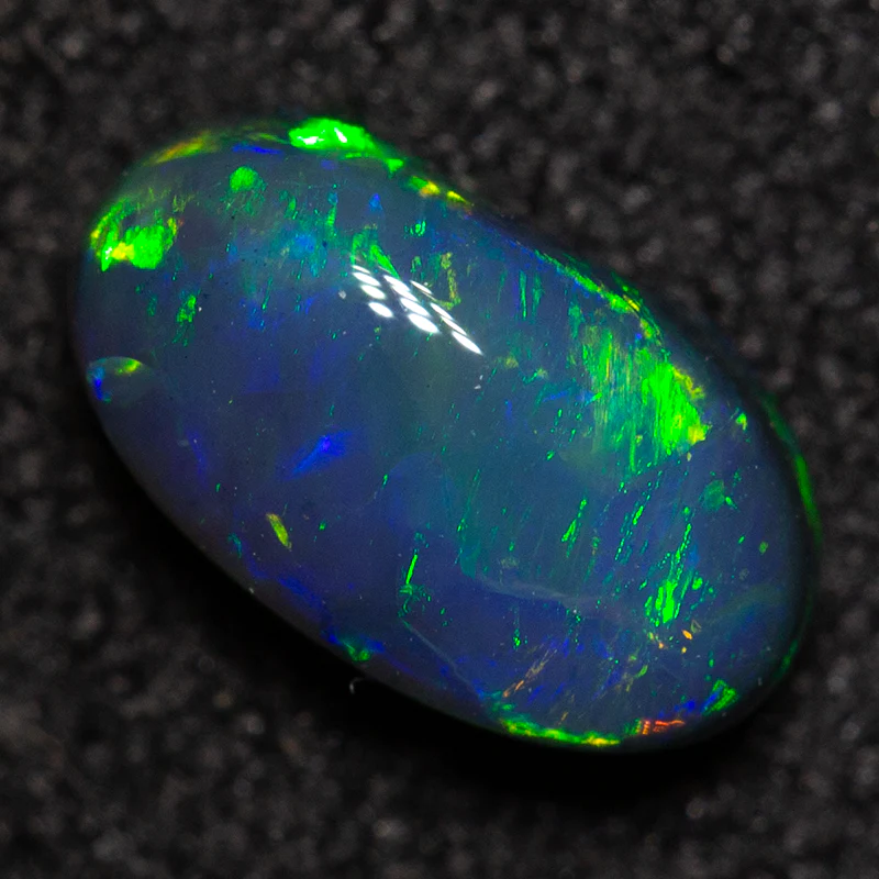 0.72 ct black opal 7.4x4.2x3.2mm - Image 3