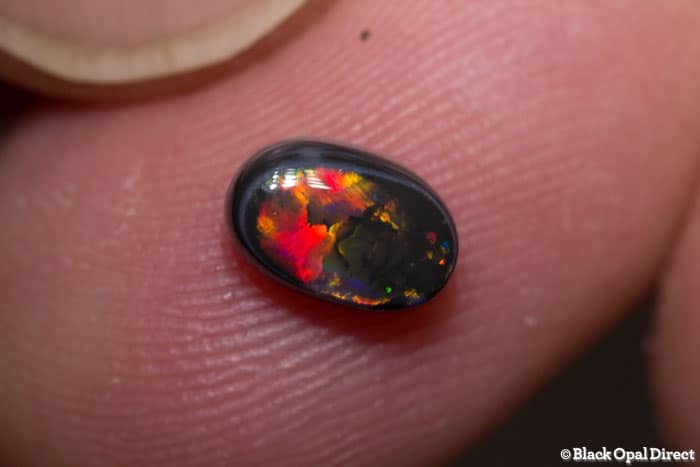0.72 ct black opal 7x5x3mm - Image 2