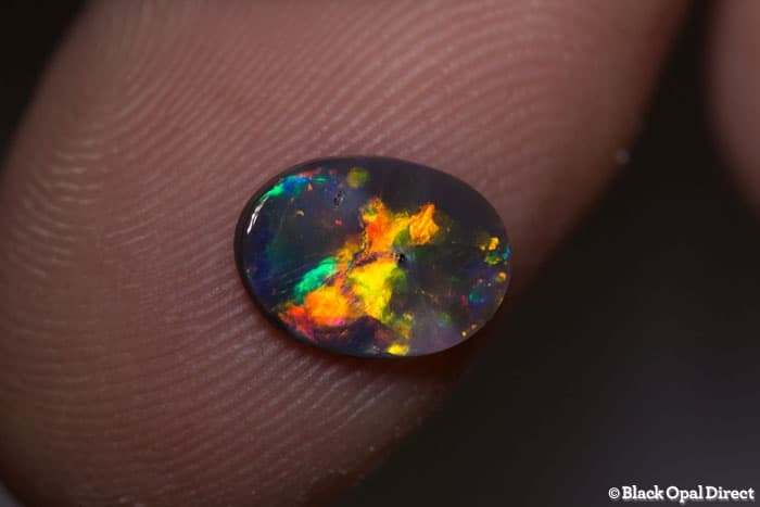 0.72 ct black opal 9.5x7x1.5mm - Image 3