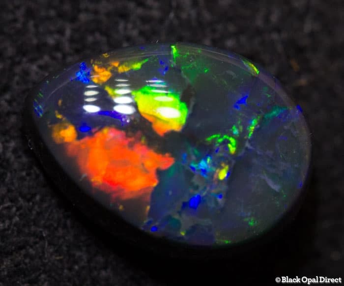 0.72 ct black opal drop shape 7.5x5x3mm - Image 2