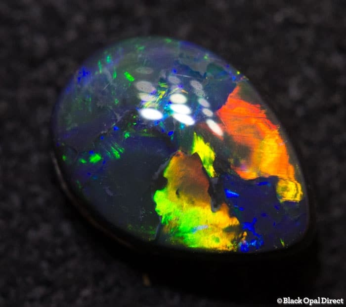 0.72 ct black opal drop shape 7.5x5x3mm - Image 3