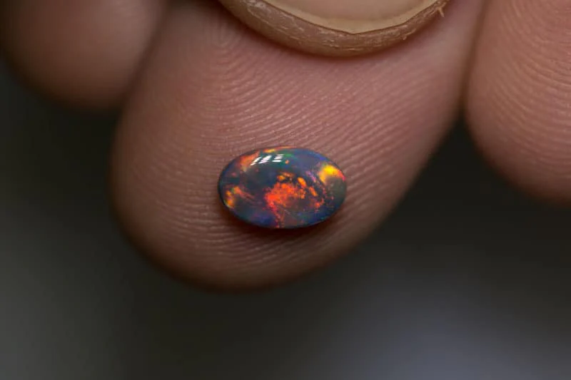 0.72 ct dark gem opal 8x5x2.5mm - Image 3