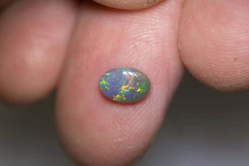 0.72 ct dark opal 7.5x5x2mm - Image 2