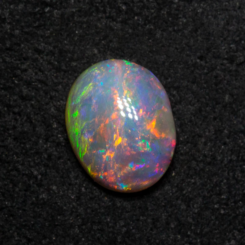 0.72 ct dark opal 7x5.5x3.1mm - Image 2