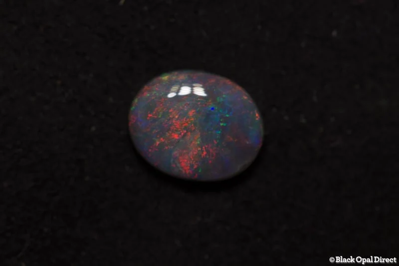 0.72 ct semi black opal 7x6x2mm - Image 2