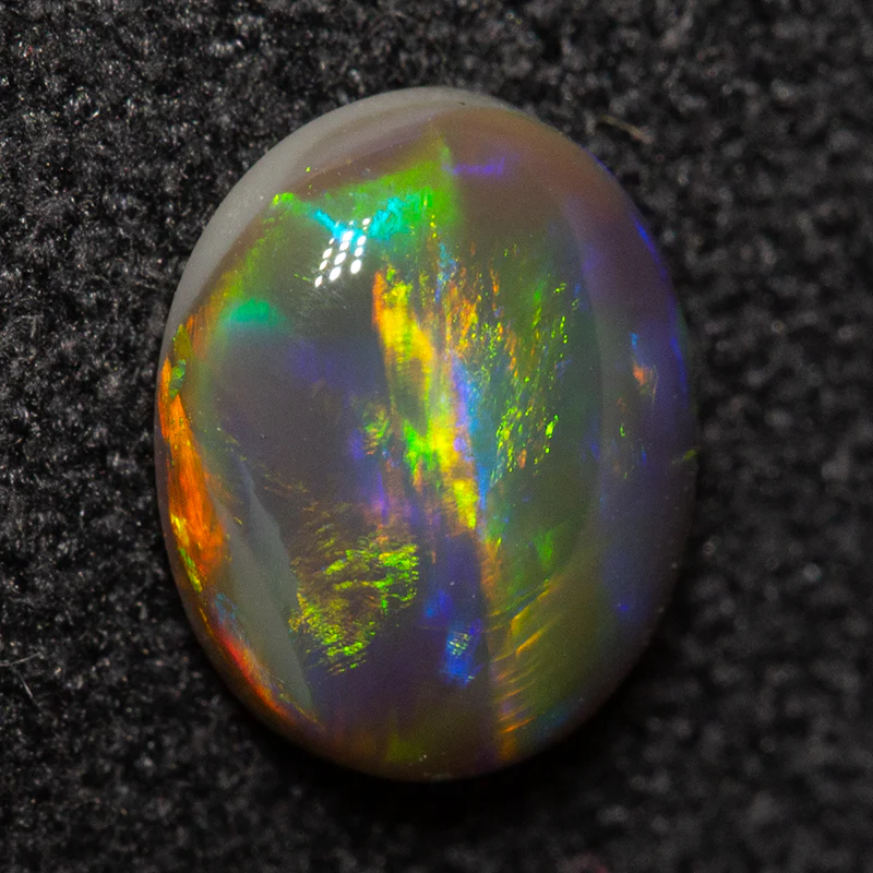 0.73 ct black opal 7.2x5.8x2.7mm - Image 2
