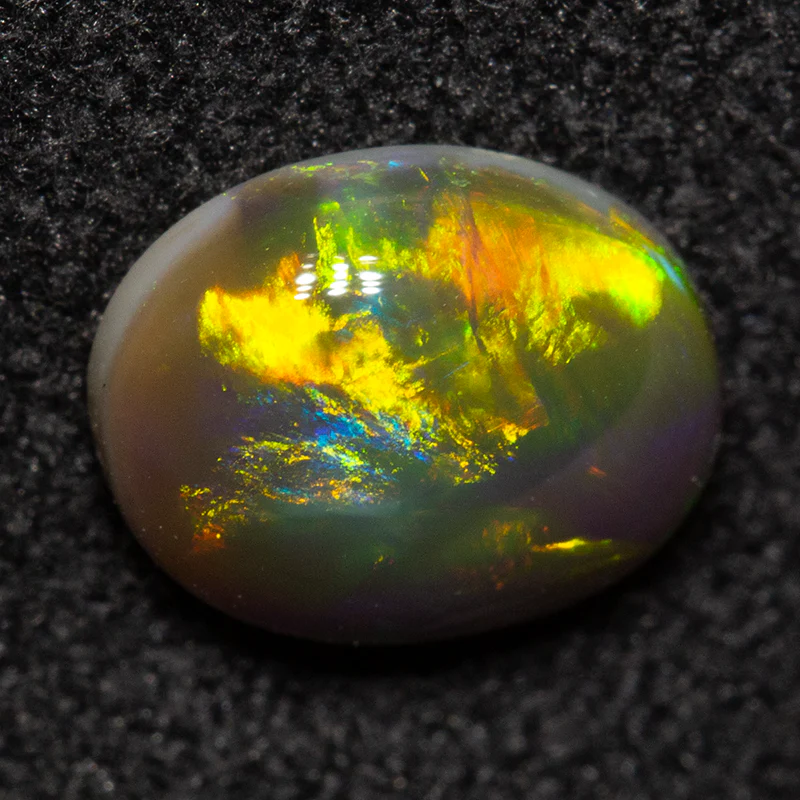 0.73 ct black opal 7.2x5.8x2.7mm - Image 4