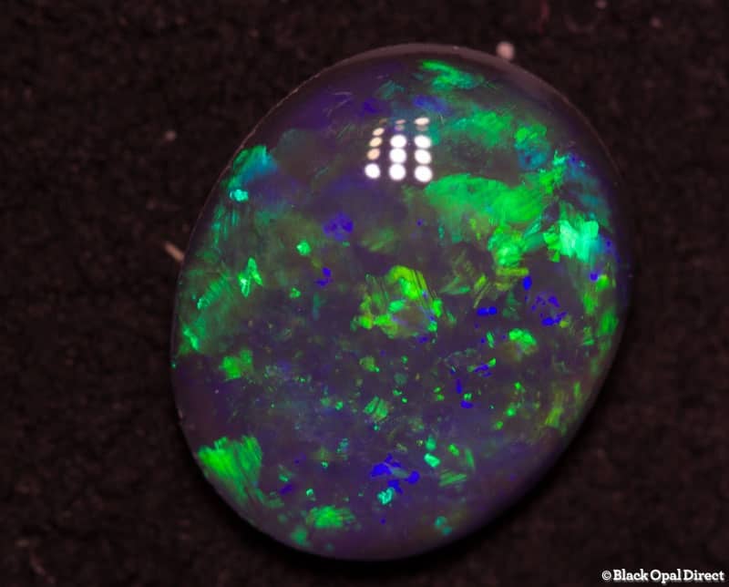 0.73 ct black opal 7.5x6x3mm - Image 2