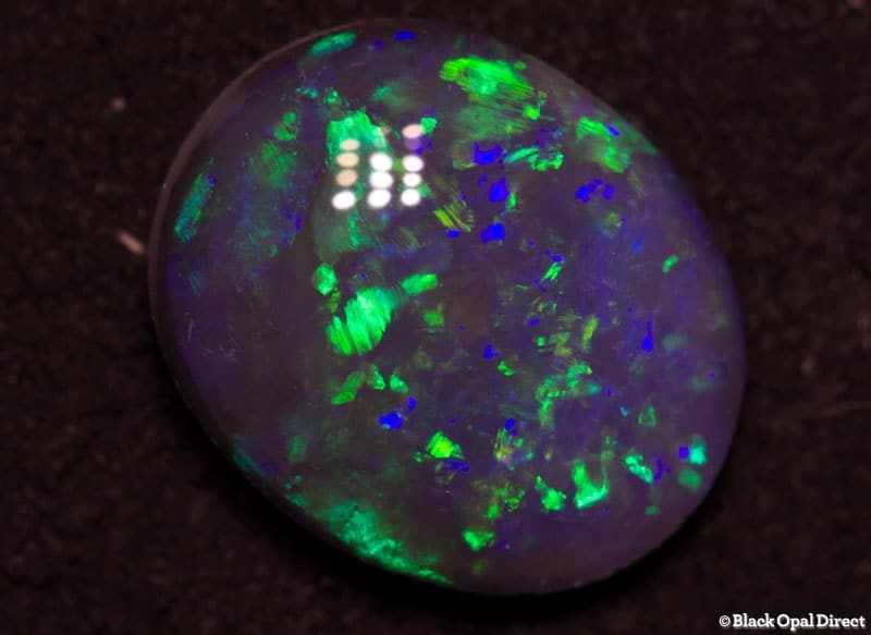 0.73 ct black opal 7.5x6x3mm - Image 4