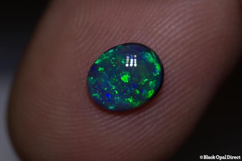0.73 ct black opal 7.5x6x3mm - Image 5
