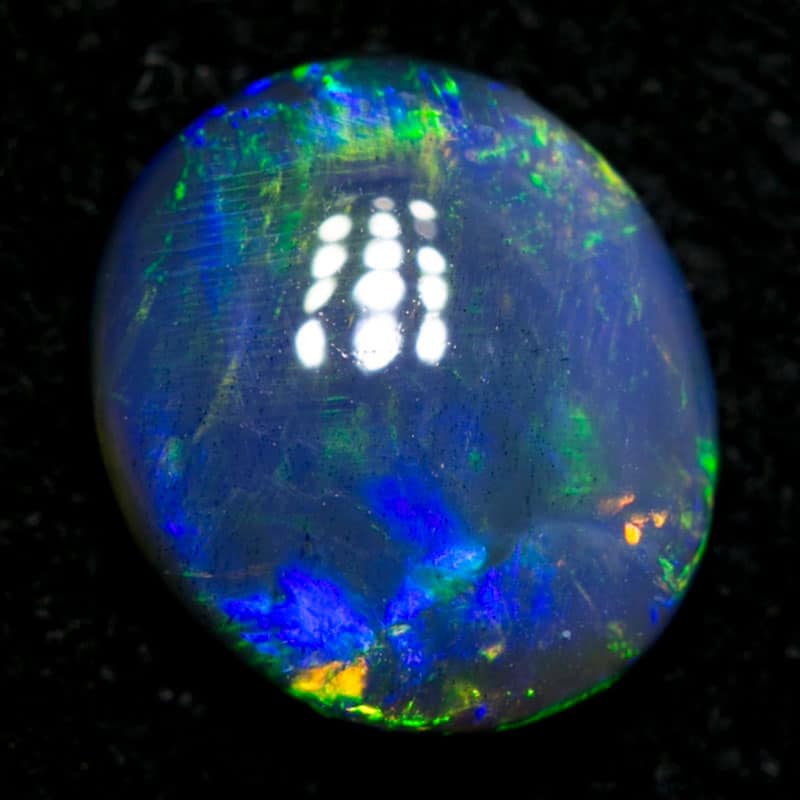 0.73 ct black opal 7x6x2mm - Image 3