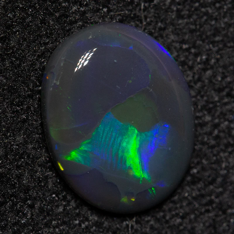 0.73 ct black opal 8.4x6.7x2.1mm - Image 2