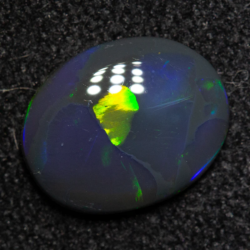 0.73 ct black opal 8.4x6.7x2.1mm - Image 3