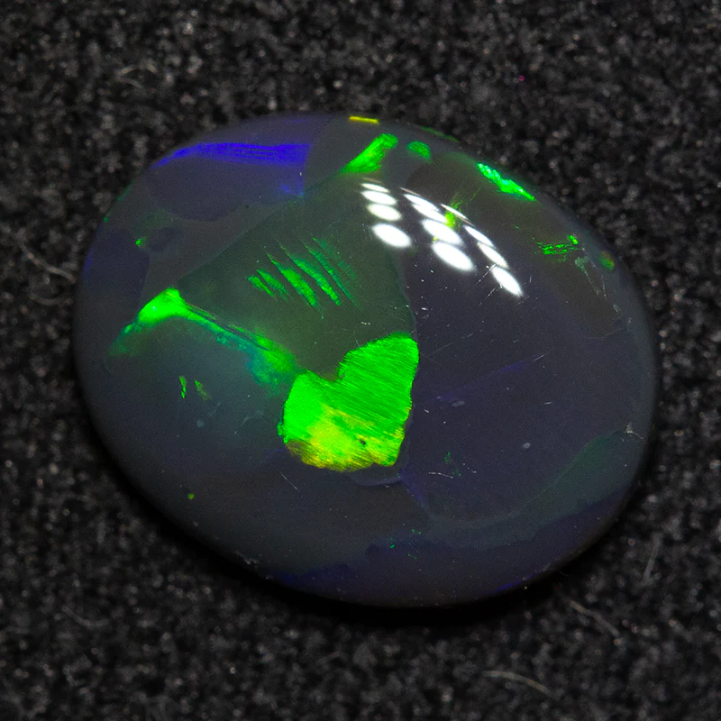 0.73 ct black opal 8.4x6.7x2.1mm - Image 4