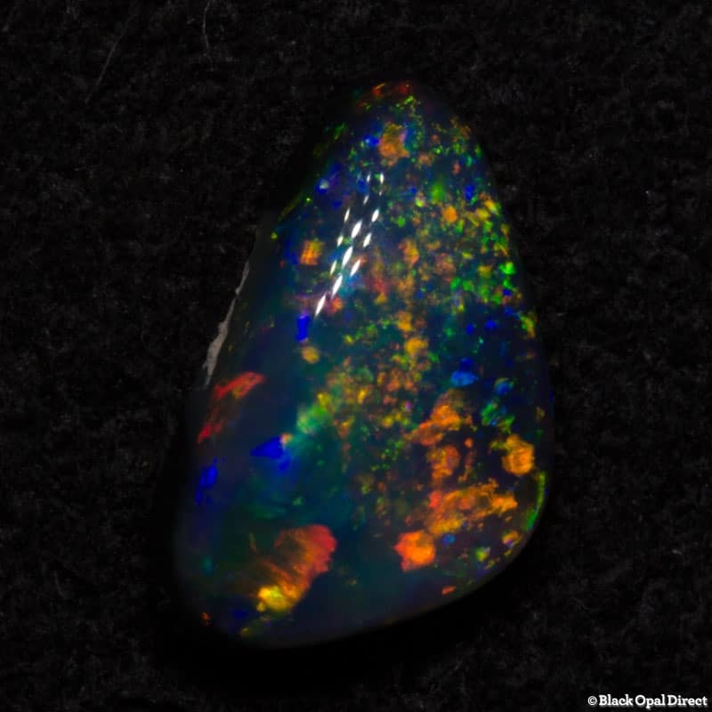 0.73 ct black opal gem 8x5x3mm - Image 2