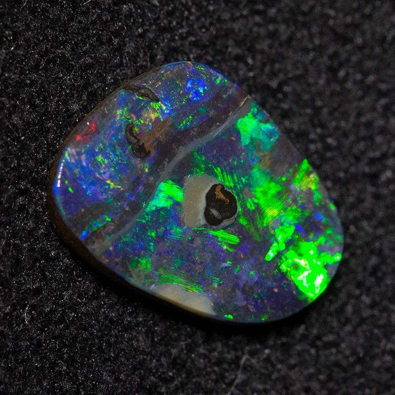 0.73 ct boulder opal 8.3x6.5x1.6mm - Image 2
