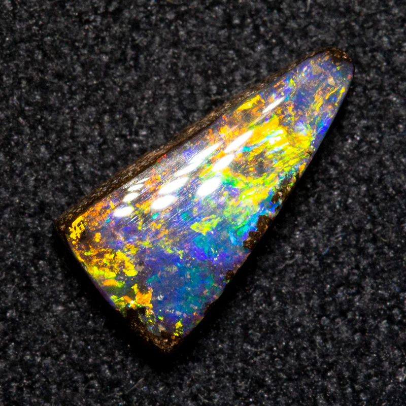 0.73 ct boulder opal 8.6x4.3x2.3mm - Image 2